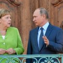 Путин и Меркель обсудили Украину и "Северный поток" Путин и Меркель обсудили Украину и "Северный поток"